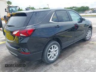 2023 Chevrolet Equinox LT with VIN 3GNAXUEG5PL268771, listed as a IAAI auction lot 42255946 with 43,253 mi miles and . Bid and sale history available at DreamBid. Image 4.