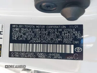 2022 Toyota Prius L Eco with VIN JTDKAMFUXN3163123, listed as a IAAI auction lot 41666679 with 68,026 mi miles. Bid and sale history available at carsss.com. Image 9.