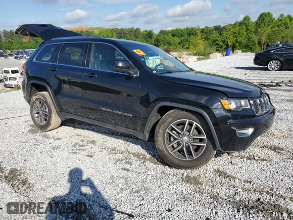 2018 Jeep Grand Cherokee Laredo E with VIN 1C4RJEAGXJC246874, listed as a Copart auction lot 56722005 with 101,493 mi miles and Salvage title. Bid and sale history available at DreamBid. Image 4.