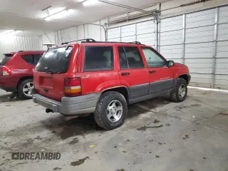 1997 Jeep Grand Cherokee Laredo with VIN 1J4GZ58Y9VC629994, listed as a Copart auction lot 83086694 with 252,147 mi miles and Salvage Title. Bid and sale history available at carsss.com. Image 3.