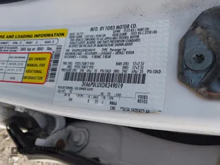 2013 Ford Fusion SE Hybrid with VIN 3FA6P0LUXDR349019, listed as a IAAI auction lot 42800125 with 143,089 mi miles and . Bid and sale history available at DreamBid. Image 9.
