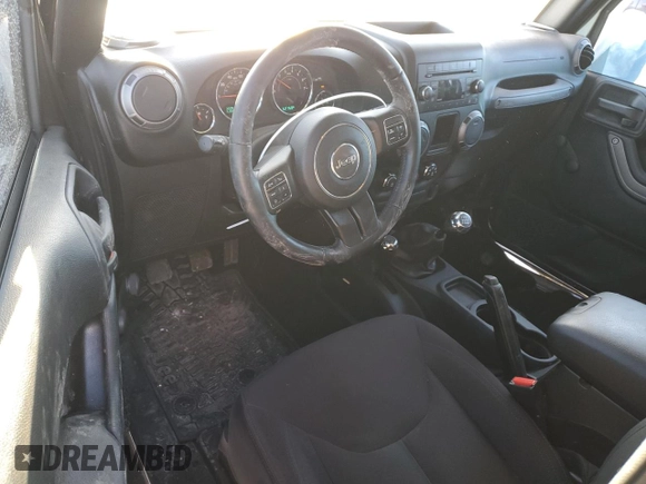 2017 Jeep Wrangler Willys Wheeler with VIN 1C4AJWAG2HL638213, listed as a Copart auction lot 88121675 with 62,760 mi miles and Salvage Title. Bid and sale history available at DreamBid. Image 8.