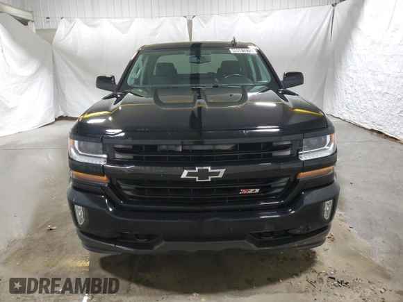 2016 Chevrolet Silverado 1500 LT with VIN 1GCVKREC9GZ315960, listed as a Copart auction lot 48661275 with 120,006 mi miles and Clean Title. Bid and sale history available at DreamBid. Image 5.
