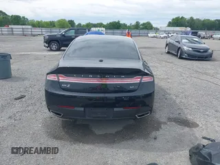 2015 Lincoln MKZ z VIN 3LN6L2JK7FR622029, wystawiony jako IAAI lot #42180170 z przebiegiem 107 732 mil mil oraz . Historia ofert i sprzedaży dostępna na DreamBid. Obrazek 17.
