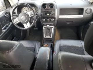 2016 Jeep Compass Latitude with VIN 1C4NJDEB8GD757624, listed as a Copart auction lot 84997714 with 140,906 mi miles and Salvage Title. Bid and sale history available at carsss.com. Image 8.