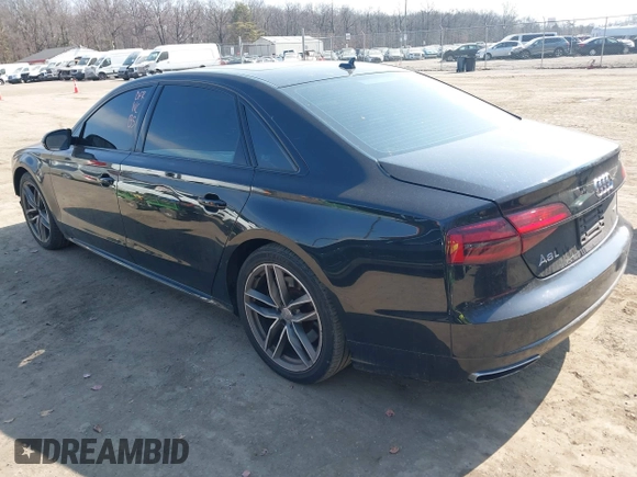 2017 Audi A8 with VIN WAU44AFDXHN004395, listed as a IAAI auction lot 41705688 with 63,282 mi miles and . Bid and sale history available at DreamBid. Image 3.