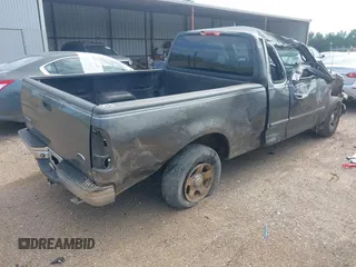 2002 Ford F-150 XL with VIN 1FTRX17W72NA87338, listed as a IAAI auction lot 42583398 with Not provided miles and . Bid and sale history available at DreamBid. Image 4.