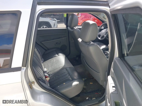 2007 Jeep Grand Cherokee Laredo with VIN 1J8GS48K57C545151, listed as a IAAI auction lot 41959178 with 148,534 mi miles. Bid and sale history available at carsss.com. Image 8.