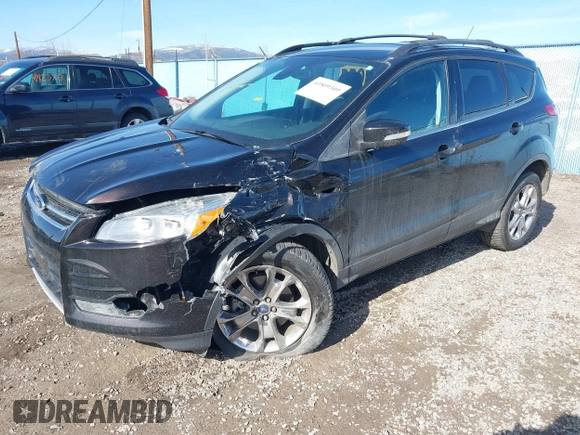2013 Ford Escape SEL with VIN 1FMCU9H93DUB56102, listed as a IAAI auction lot 41809309 with 60,498 mi miles. Bid and sale history available at carsss.com. Image 2.