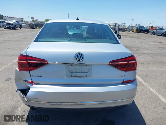2017 Volkswagen Passat S with VIN 1VWAT7A32HC009657, listed as a IAAI auction lot 42541472 with 100,026 mi miles and . Bid and sale history available at DreamBid. Image 16.