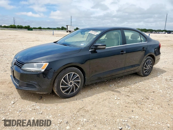 2013 Volkswagen Jetta SE with VIN 3VWDX7AJ3DM434233, listed as a Copart auction lot 60697485 with 74,333 mi miles and Salvage title. Bid and sale history available at DreamBid. Image 1.