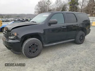 2014 Chevrolet Tahoe Commercial with VIN 1GNSK2E08ER175100, listed as a Copart auction lot 48139765 with 183,925 mi miles and Salvage title. Bid and sale history available at DreamBid. Image 1.