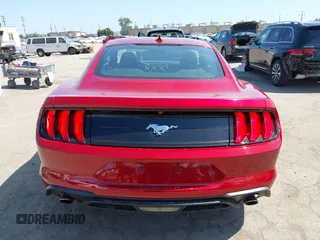 2021 Ford Mustang EcoBoost with VIN 1FA6P8TH7M5125744, listed as a IAAI auction lot 42520877 with 31,953 mi miles and . Bid and sale history available at DreamBid. Image 16.