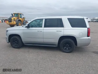 2015 Chevrolet Tahoe Commercial with VIN 1GNSK2ECXFR681555, listed as a IAAI auction lot 41975359 with 126,785 mi miles. Bid and sale history available at carsss.com. Image 14.