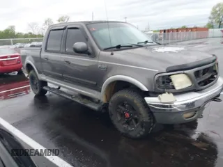 2003 Ford F-150 XLT with VIN 1FTRW08L43KD25506, listed as a IAAI auction lot 41941847 with 1 mi miles. Bid and sale history available at carsss.com. Image 1.