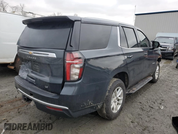 2022 Chevrolet Tahoe LT with VIN 1GNSKNKD0NR161796, listed as a Copart auction lot 42320075 with 84,387 mi miles and Salvage title. Bid and sale history available at DreamBid. Image 3.