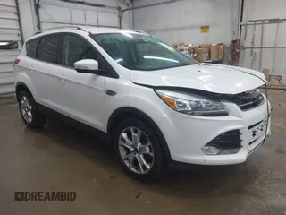 2014 Ford Escape Titanium with VIN 1FMCU9J90EUD21552, listed as a IAAI auction lot 42102148 with 183,539 mi miles. Bid and sale history available at carsss.com. Image 1.