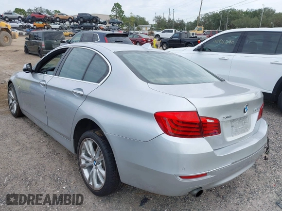 2015 BMW 5 Series 535i xDrive with VIN WBA5B3C54FD544802, listed as a IAAI auction lot 41283822 with 93,828 mi miles. Bid and sale history available at carsss.com. Image 3.