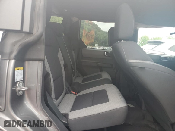 2022 Ford Bronco with VIN 1FMDE5BH3NLB54318, listed as a Copart auction lot 58734885 with 27,033 mi miles and Salvage title. Bid and sale history available at DreamBid. Image 11.