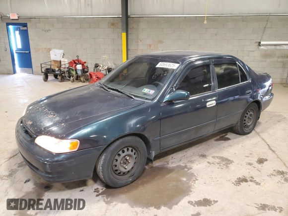 1999 Toyota Corolla VE with VIN 2T1BR12E2XC136739, listed as a Copart auction lot 60693625 with 170,989 mi miles and Salvage title. Bid and sale history available at DreamBid. Image 1.