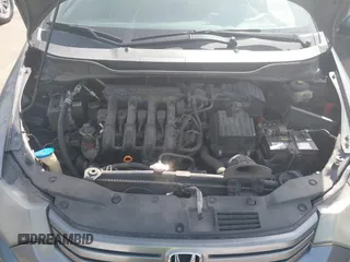 2010 Honda Insight EX with VIN JHMZE2H71AS032532, listed as a IAAI auction lot 41988221 with 333,144 mi miles and . Bid and sale history available at DreamBid. Image 10.
