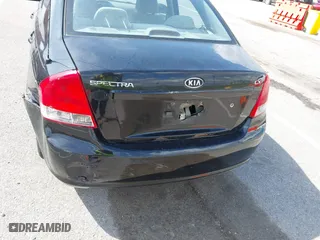 2009 Kia Spectra EX with VIN KNAFE221495631702, listed as a IAAI auction lot 41875896 with 234,550 mi miles. Bid and sale history available at carsss.com. Image 12.