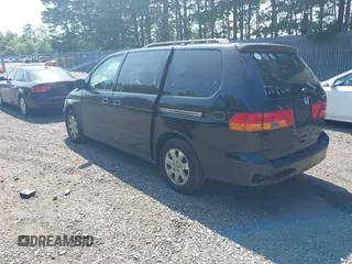 2003 Honda Odyssey EX-L with VIN 5FNRL18003B042487, listed as a IAAI auction lot 42604399 with 188,126 mi miles and . Bid and sale history available at DreamBid. Image 3.