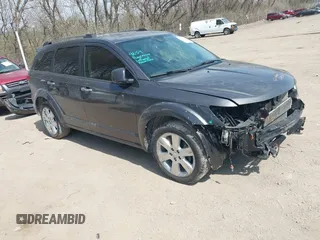 2014 Dodge Journey Limited with VIN 3C4PDDDG8ET199813, listed as a IAAI auction lot 41919196 with 199,096 mi miles and . Bid and sale history available at carsss.com. Image 1.