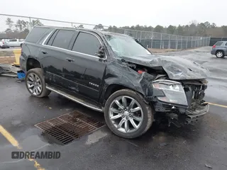 2016 Chevrolet Tahoe LTZ with VIN 1GNSCCKC5GR190061, listed as a IAAI auction lot 41204718 with 174,420 mi miles and . Bid and sale history available at DreamBid. Image 1.