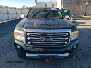 2015 GMC Canyon 4WD SLT with VIN 1GTG6CE35F1246241, listed as a Copart auction lot 74748254 with 126,389 mi miles and Salvage Title. Bid and sale history available at carsss.com. Image 5.