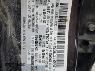 2012 Mazda CX-9 Touring z VIN JM3TB2CA7C0359154, wystawiony jako Copart lot #54007685 z przebiegiem 192 671 mil mil oraz Szkoda całkowita • Salvage title. Historia ofert i sprzedaży dostępna na DreamBid. Obrazek 13.