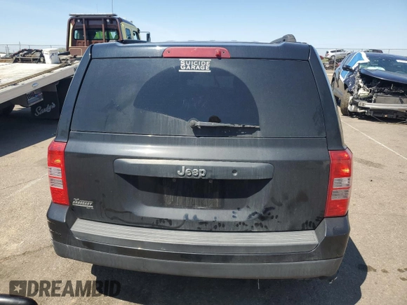 2014 Jeep Patriot Altitude with VIN 1C4NJPBA1ED715273, listed as a Copart auction lot 54335405 with 118,975 mi miles and Salvage Title. Bid and sale history available at DreamBid. Image 6.