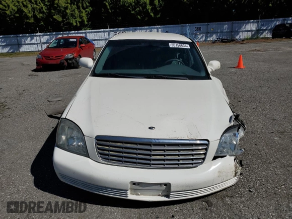 2005 Cadillac DeVille z VIN 1G6KD54Y65U100231, wystawiony jako Copart lot #55758605 z przebiegiem 166 871 mil mil oraz Szkoda całkowita • Salvage title. Historia ofert i sprzedaży dostępna na DreamBid. Obrazek 5.