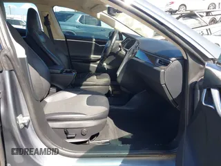 2014 Tesla Model S 60 with VIN 5YJSA1S15EFP29010, listed as a IAAI auction lot 41798180 with 142,754 mi miles and . Bid and sale history available at DreamBid. Image 5.
