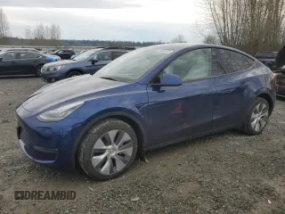2023 Tesla Model Y Long Range z VIN 7SAYGDEE2PA102275, wystawiony jako Copart lot #41652975 z przebiegiem 12 081 mil mil oraz Szkody całkowita. Historia ofert i sprzedaży dostępna na DreamBid. Obrazek 1.