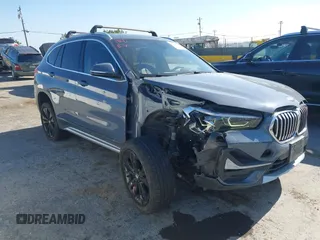 2020 BMW X1 xDrive28i with VIN WBXJG9C02L5R24899, listed as a IAAI auction lot 42217617 with 65,195 mi miles and . Bid and sale history available at DreamBid. Image 1.
