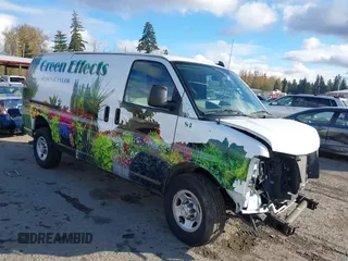 2023 Chevrolet Express Cargo Van with VIN 1GCWGAFP1P1122600, listed as a IAAI auction lot 40697460 with 3,699 mi miles. Bid and sale history available at carsss.com. Image 1.