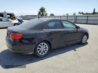 2014 Volkswagen Jetta SE with VIN 3VWD17AJ0EM268515, listed as a Copart auction lot 59977225 with 163,365 mi miles and Salvage title. Bid and sale history available at DreamBid. Image 3.