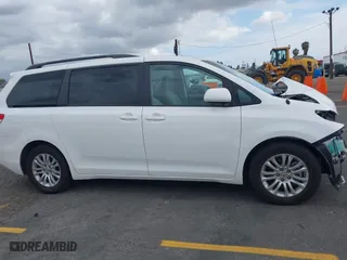 2014 Toyota Sienna XLE with VIN 5TDYK3DCXES470852, listed as a IAAI auction lot 42053266 with 48,512 mi miles. Bid and sale history available at carsss.com. Image 13.