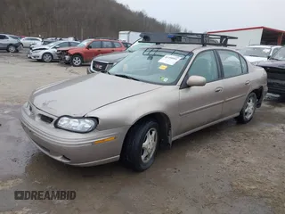 1999 Oldsmobile Cutlass GL z VIN 1G3NB52J8X6318863, wystawiony jako IAAI lot #41490091 z przebiegiem 106 821 mil mil oraz . Historia ofert i sprzedaży dostępna na DreamBid. Obrazek 2.
