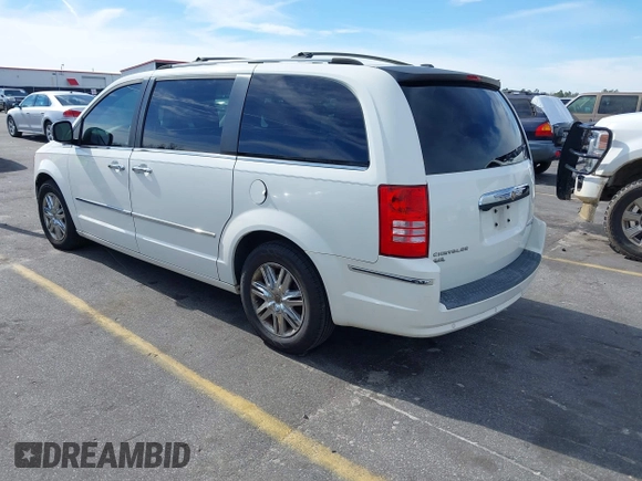 2010 Chrysler Town & Country Limited with VIN 2A4RR6DX7AR124114, listed as a IAAI auction lot 41595803 with 183,684 mi miles. Bid and sale history available at carsss.com. Image 3.