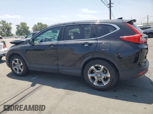 2019 Honda CR-V EX with VIN 5J6RW1H55KA047950, listed as a Copart auction lot 61030775 with 69,817 mi miles and Salvage title. Bid and sale history available at DreamBid. Image 2.
