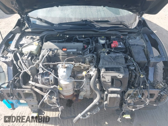 2020 Honda Civic LX with VIN 2HGFC2F65LH505932, listed as a IAAI auction lot 40046863 with 59,768 mi miles and . Bid and sale history available at DreamBid. Image 10.