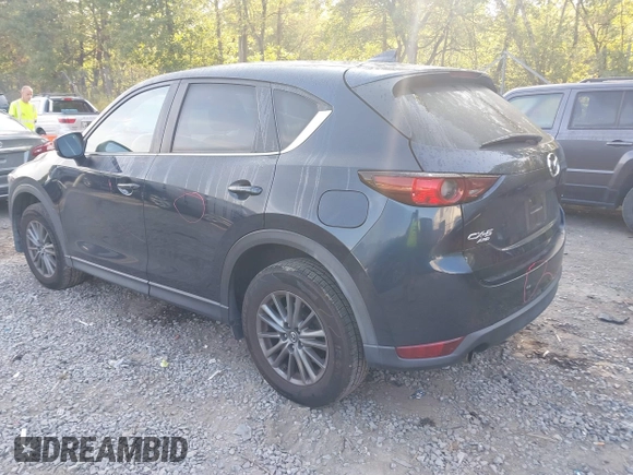 2017 Mazda CX-5 Touring with VIN JM3KFBCL6H0170455, listed as a IAAI auction lot 40381242 with 71,520 mi miles. Bid and sale history available at carsss.com. Image 3.