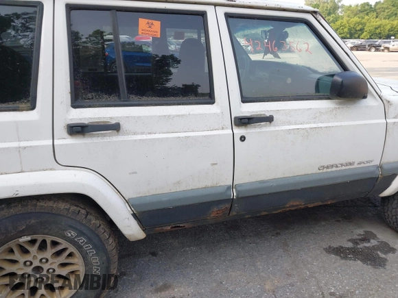 1999 Jeep Cherokee Sport z VIN 1J4FF68S0XL663735, wystawiony jako IAAI lot #42463562 z przebiegiem Nie podano mil oraz . Historia ofert i sprzedaży dostępna na DreamBid. Obrazek 15.