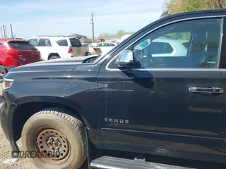 2015 Chevrolet Tahoe LTZ z VIN 1GNSKCKC8FR141163, wystawiony jako IAAI lot #42114008 z przebiegiem 221 804 mil mil oraz . Historia ofert i sprzedaży dostępna na DreamBid. Obrazek 14.