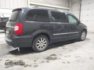 2014 Chrysler Town & Country Touring with VIN 2C4RC1BG8ER300882, listed as a IAAI auction lot 42068878 with 161,002 mi miles and . Bid and sale history available at DreamBid. Image 4.