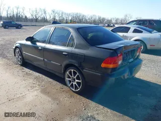 1997 Honda Civic LX with VIN 2HGEJ6670VH567081, listed as a IAAI auction lot 41995007 with 107,943 mi miles. Bid and sale history available at carsss.com. Image 3.