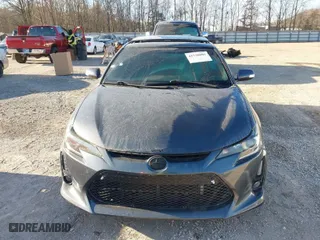 2014 Scion tC with VIN JTKJF5C74E3083312, listed as a IAAI auction lot 41730086 with 118,124 mi miles. Bid and sale history available at carsss.com. Image 12.