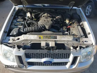 2003 Ford Explorer Sport Trac XLS z VIN 1FMZU67EX3UB19974, wystawiony jako IAAI lot #42563671 z przebiegiem 133 452 mil mil oraz . Historia ofert i sprzedaży dostępna na DreamBid. Obrazek 10.
